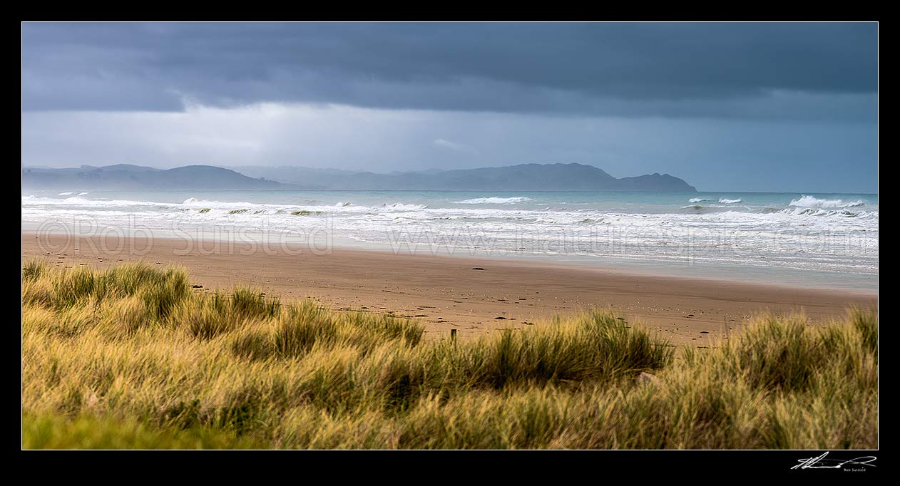 Image of Porangahau Beach on a moody day, looking north towards Blackhead Point at right. Panorama, Porangahau, Hawke's Bay Region, New Zealand (NZ) stock photo image