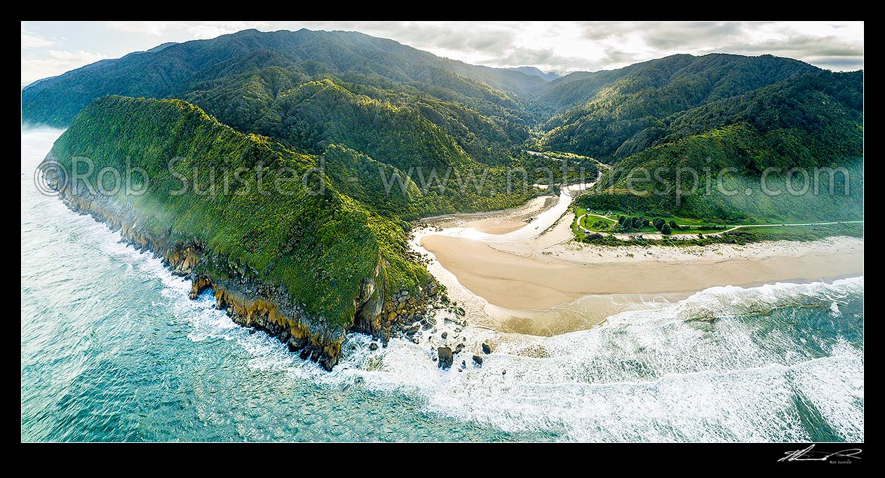 Image of Kohaihai River Valley and Heaphy Track Great Walk carpark and camping ground. Kohaihai Bluff at left. Aerial panorama on a misty morning, Kahurangi National Park, Buller District, West Coast Region, New Zealand (NZ) stock photo image