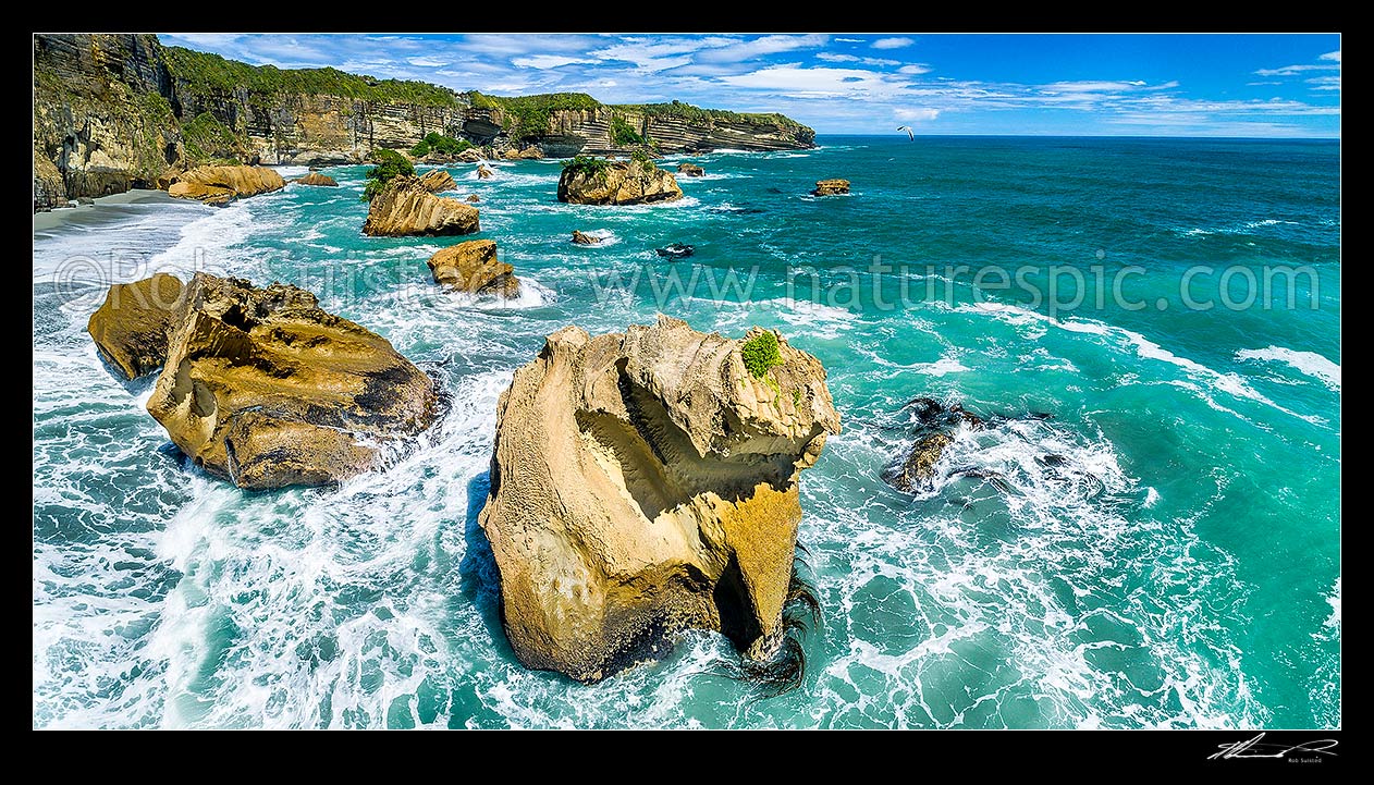 Image of Punakaiki Coast. Irimahuwheri Bay and rocky coastline. Aerial panorama looking south towards Perpendicular Point, Paparoa National Park, Buller District, West Coast Region, New Zealand (NZ) stock photo image