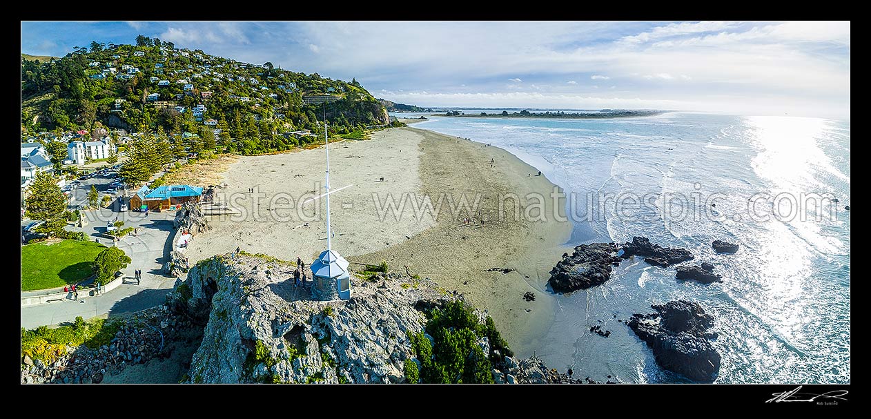 Image of Sumner Beach and Cave Rock with Heathcote Avon estuary (Ihutai) and New Brighton Beach beyond. Aerial panorama, Sumner, Christchurch City District, Canterbury Region, New Zealand (NZ) stock photo image