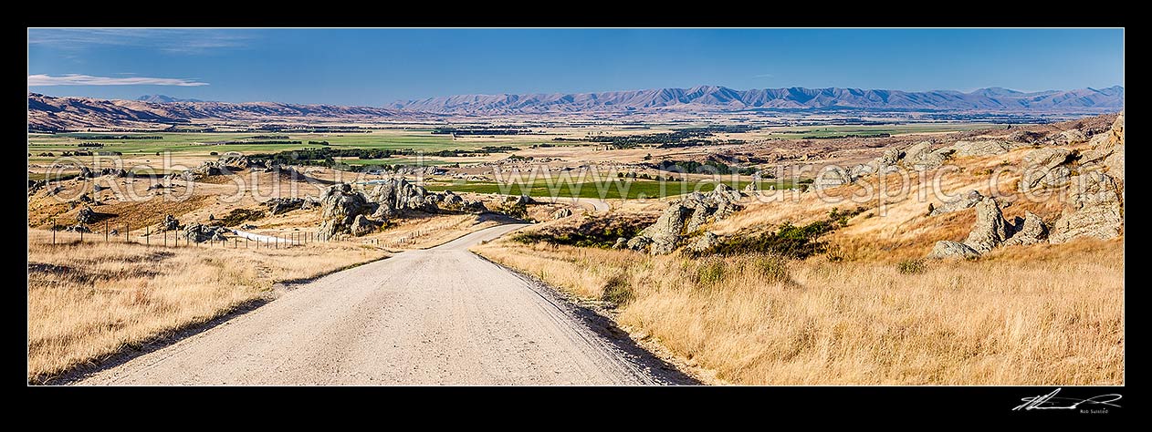 Image of Upper Taieri Plain seen from near Paerau. Panorama over irrigated plains of the Upper Taieri towards the Hawkdun and Ida Ranges. Maniototo, Patearoa, Central Otago District, Otago Region, New Zealand (NZ) stock photo image