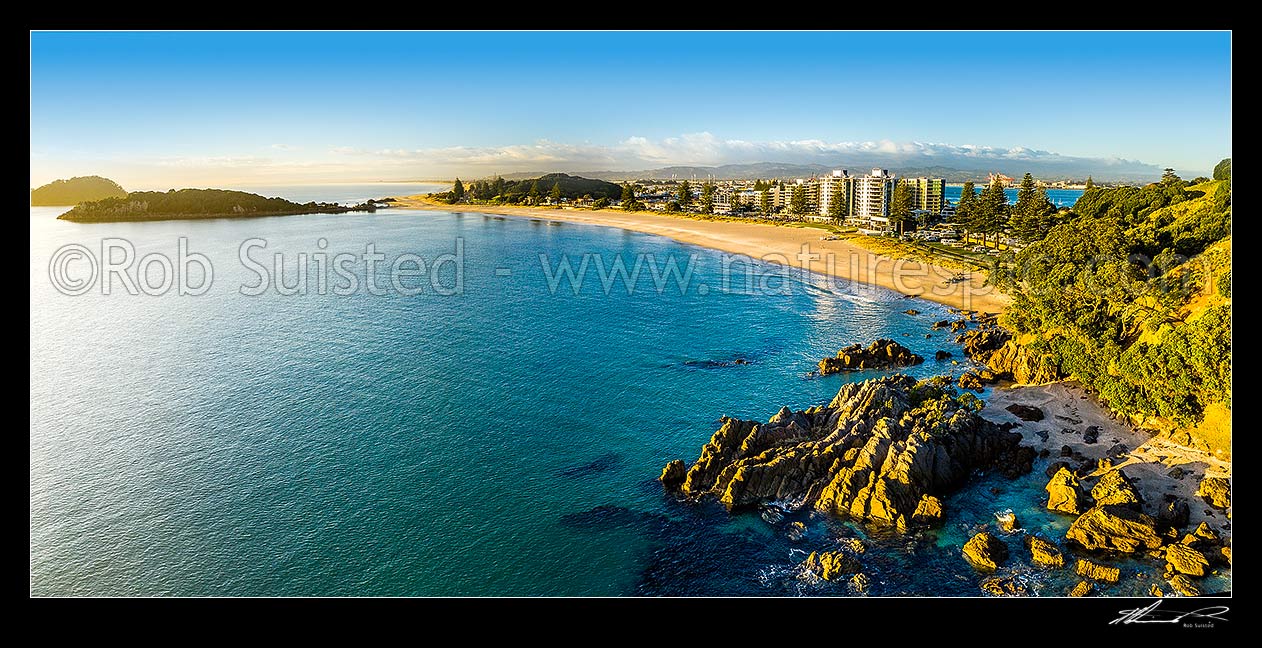 Image of Mt Maunganui Beach early morning, with Motuotau and Maturiki Islands at left. Aerial panorama, Mount Maunganui, Tauranga District, Bay of Plenty Region, New Zealand (NZ) stock photo image