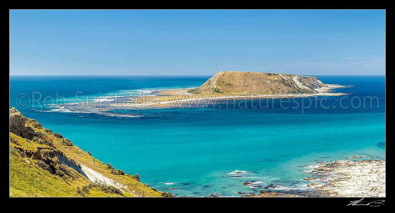 Image of Portland Island, also called Waikawa Island, a small island off the southern tip of the Mahia Peninsula at Ahuriri Point (foreground). Panorama, Mahia, Wairoa District, Hawke's Bay Region, New Zealand (NZ) stock photo image