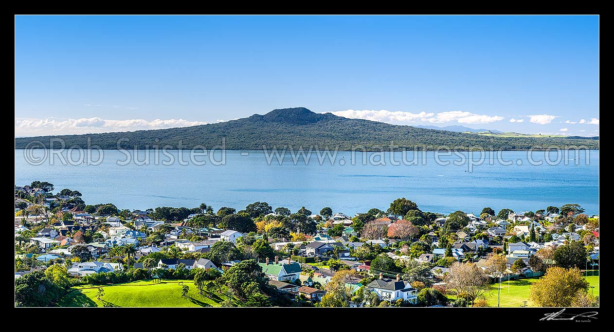 Image of Rangitoto Island (260m) in the Hauraki Gulf, seen from Devonport, looking over Cheltenham Beach and Rangitoto Channel. Panorama, Devonport, Auckland City District, Auckland Region, New Zealand (NZ) stock photo image