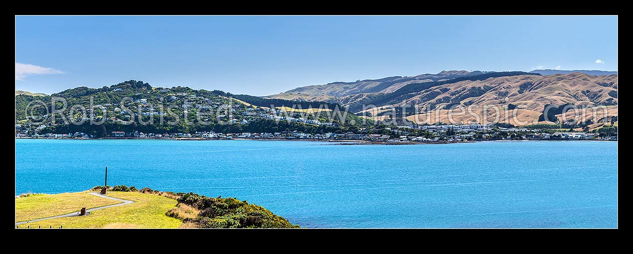 Image of Plimmerton vista, looking from Karehana Bay (left and centre) to Plimmerton Beach (right) seen from Whitireia Park above Onehunga Bay. Panorama, Plimmerton, Porirua City District, Wellington Region, New Zealand (NZ) stock photo image