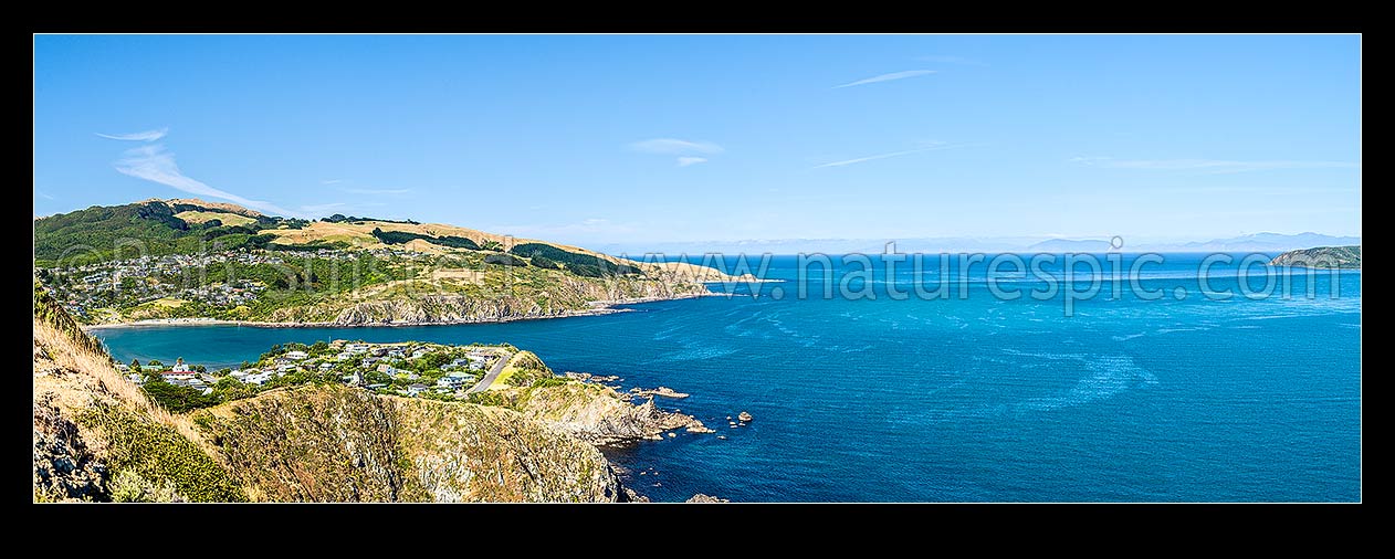 Image of Titahi Bay and Beach, looking across to Mana Island, with South Island behind across Cook Strait. Colonial Knob Scenic Reserve (468m) far left. Panorama, Titahi Bay, Porirua City District, Wellington Region, New Zealand (NZ) stock photo image