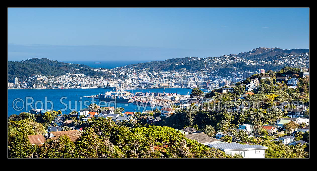 Image of Wellington panorama from Khandallah, looking down on harbour, CBD and Wellington Port. Cook Strait far beyond. Panorama, Kaiwharawhara, Wellington City District, Wellington Region, New Zealand (NZ) stock photo image