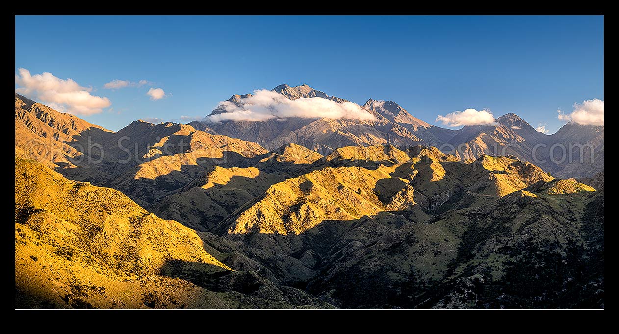 Image of Mt Tapuae-o-Uenuku (2885m) seen from the Cam River. Mt Alarm (2877m), Muzzle Pass, Mitre Peak (2621m), Trail Saddle far left. Panorama, Awatere Valley, Marlborough District, Marlborough Region, New Zealand (NZ) stock photo image