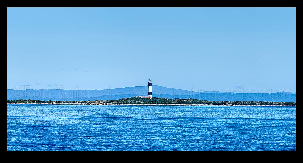 Image of Dog Island and Dog Island Lighthouse, in Foveaux Strait near Bluff. Panorama, Bluff, Invercargill District, Southland Region, New Zealand (NZ) stock photo image