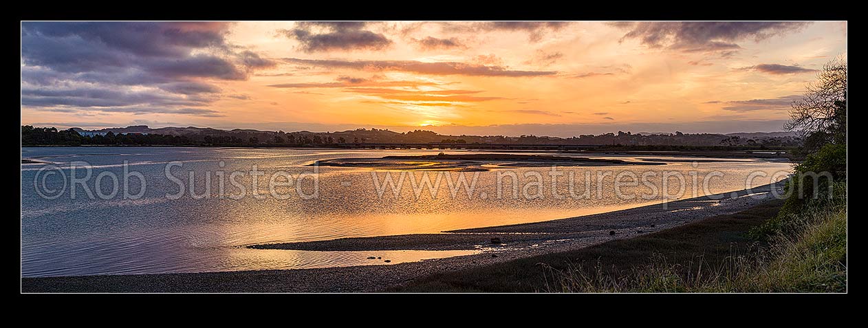 Image of Ahuriri Estuary Conservation Area sunset over the tidal wetland and saltmarshes at Westshore. Panorama, Napier, Napier City District, Hawke's Bay Region, New Zealand (NZ) stock photo image