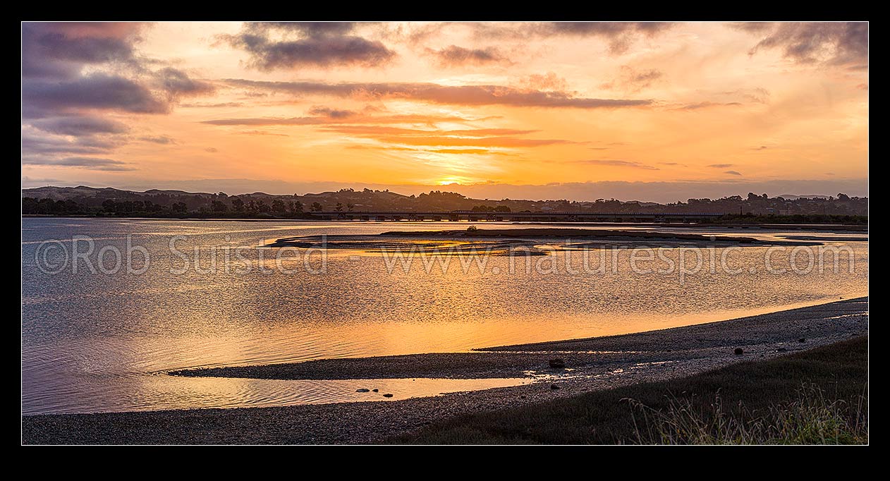 Image of Ahuriri Estuary Conservation Area sunset over the tidal wetland and saltmarshes at Westshore. Panorama, Napier, Napier City District, Hawke's Bay Region, New Zealand (NZ) stock photo image