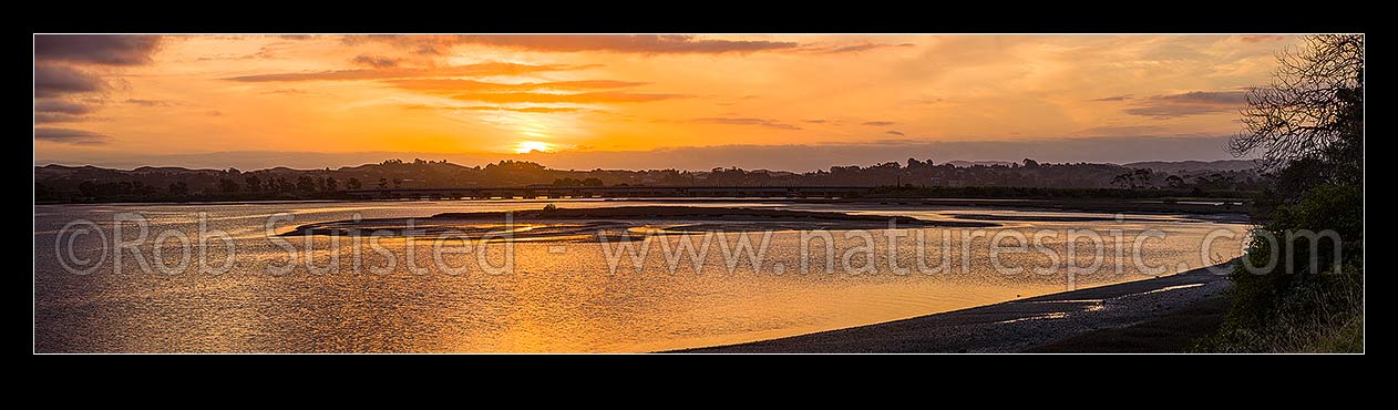 Image of Ahuriri Estuary Conservation Area sunset over the tidal wetland and saltmarshes at Westshore. Panorama, Napier, Napier City District, Hawke's Bay Region, New Zealand (NZ) stock photo image