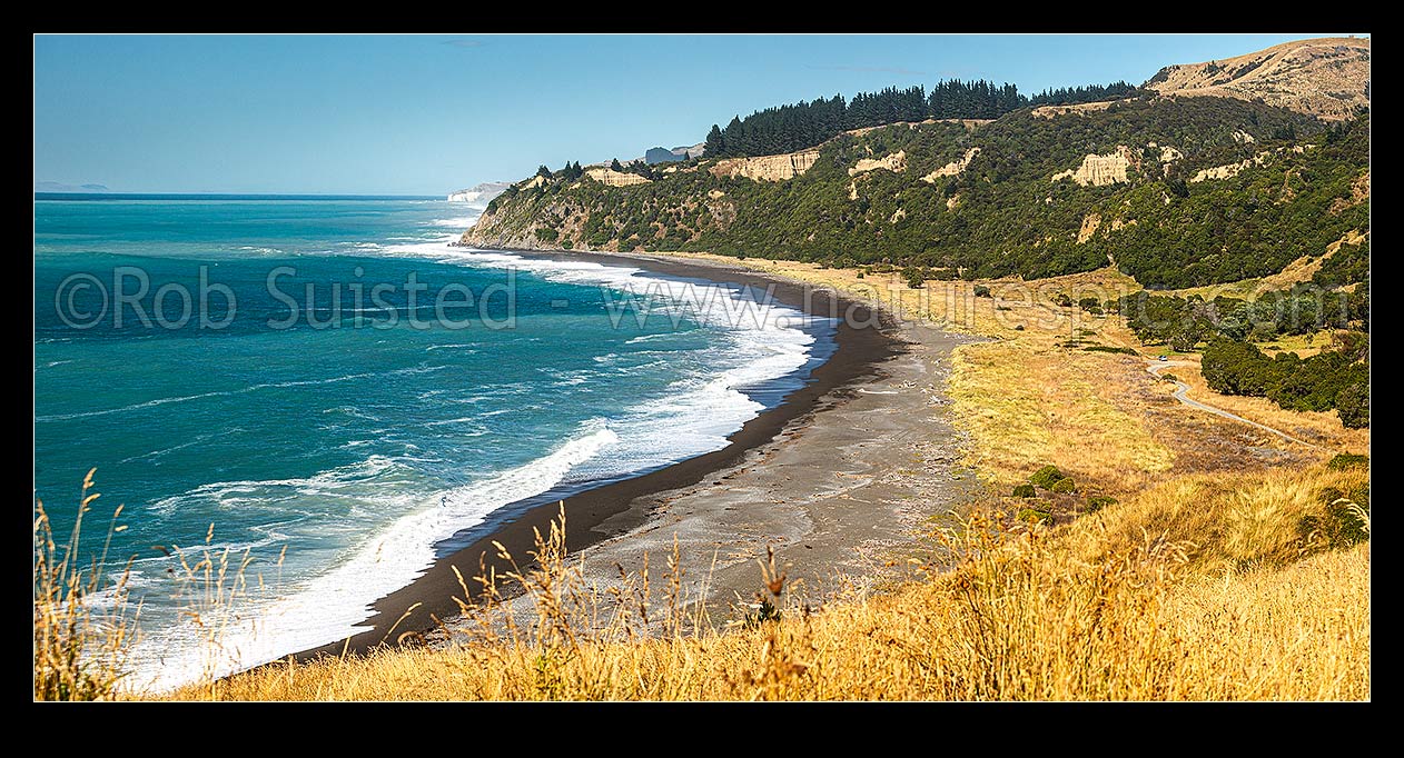 Image of Manuka Bay beach view at Port Robinson, Point Gibson. Image looking south along Port Robinson walking track towards Hurunui Mouth, Gore Bay, Hurunui District, Canterbury Region, New Zealand (NZ) stock photo image