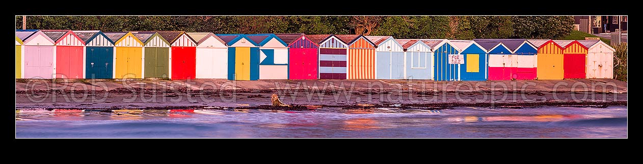 Image of Titahi Bay Beach boat sheds, a colourful brightly painted iconic feature of the bay. Panorama, Titahi Bay, Porirua City District, Wellington Region, New Zealand (NZ) stock photo image