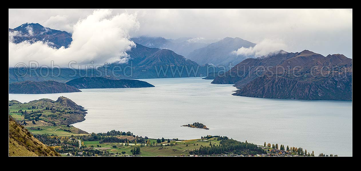 Image of Lake Wanaka panorama. Mou Waho Island centre left. Minaret Burn centre, Mt Albert far left, Roys Peninsula at bottom left. Panorama, Wanaka, Queenstown Lakes District, Otago Region, New Zealand (NZ) stock photo image