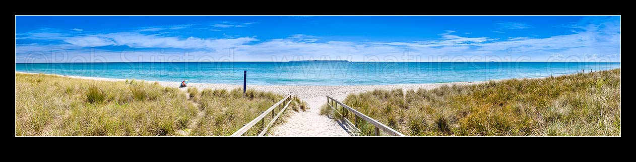 Image of Papamoa Beach, looking down sand hill access path to white sand beach, with Motiti Island beyond. Lone beach goer with sun umbrella. Panorama, Papamoa Beach, Tauranga District, Bay of Plenty Region, New Zealand (NZ) stock photo image