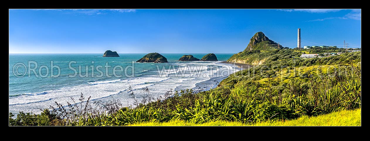 Image of Nga Motu Sugar Loaf Islands, Paritutu Rock (154m) and distinctive power station chimney landmark behind. Nga Motu Taranaki. Panorama, New Plymouth, New Plymouth District, Taranaki Region, New Zealand (NZ) stock photo image