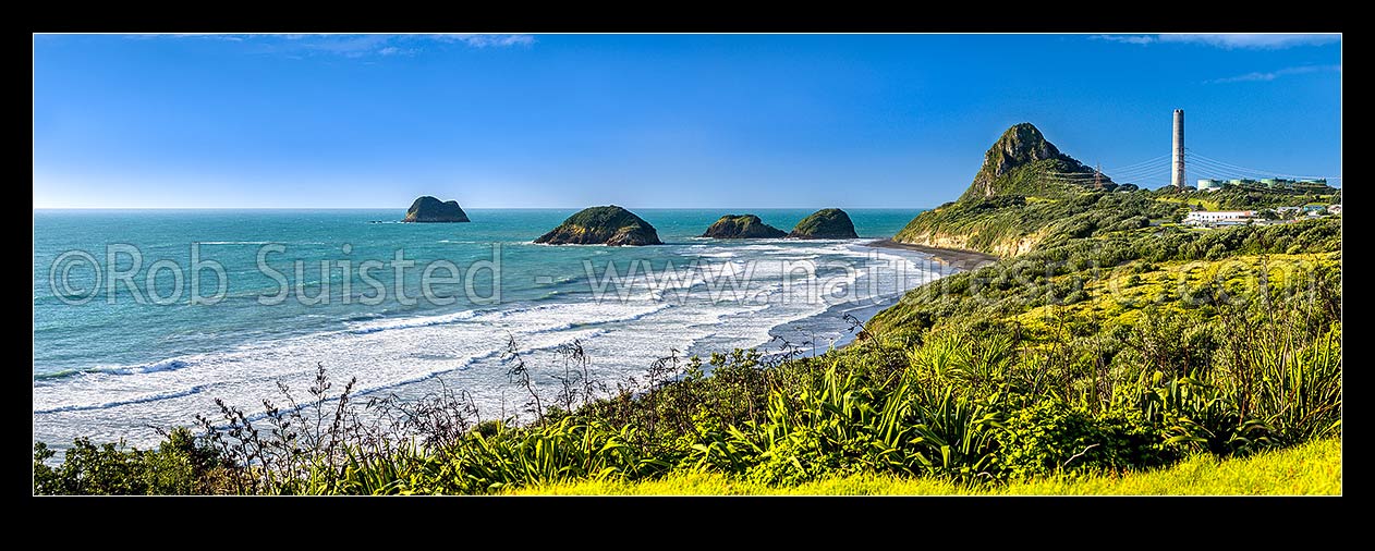 Image of Nga Motu Sugar Loaf Islands, Paritutu Rock (154m) and distinctive power station chimney landmark behind. Nga Motu Taranaki. Panorama, New Plymouth, New Plymouth District, Taranaki Region, New Zealand (NZ) stock photo image