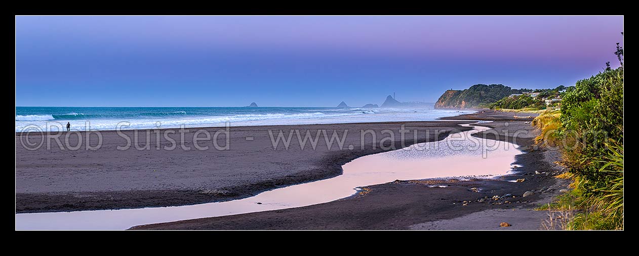 Image of Oakura Beach & Waimoku Stream on a calm moody twilight. Nga Motu Sugar Loaf Islands, Paritutu Rock (154m) and power station chimney behind. Panorama, Oakura, New Plymouth District, Taranaki Region, New Zealand (NZ) stock photo image