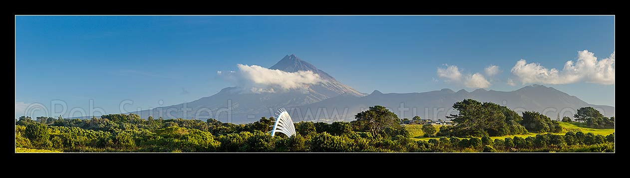 Image of Te Rewarewa Bridge over the Waiwhakaiho River on the New Plymouth Coastal walkway, with Mt Taranaki (2511m, centre and Pouakai Range left) behind. Panorama, New Plymouth, New Plymouth District, Taranaki Region, New Zealand (NZ) stock photo image