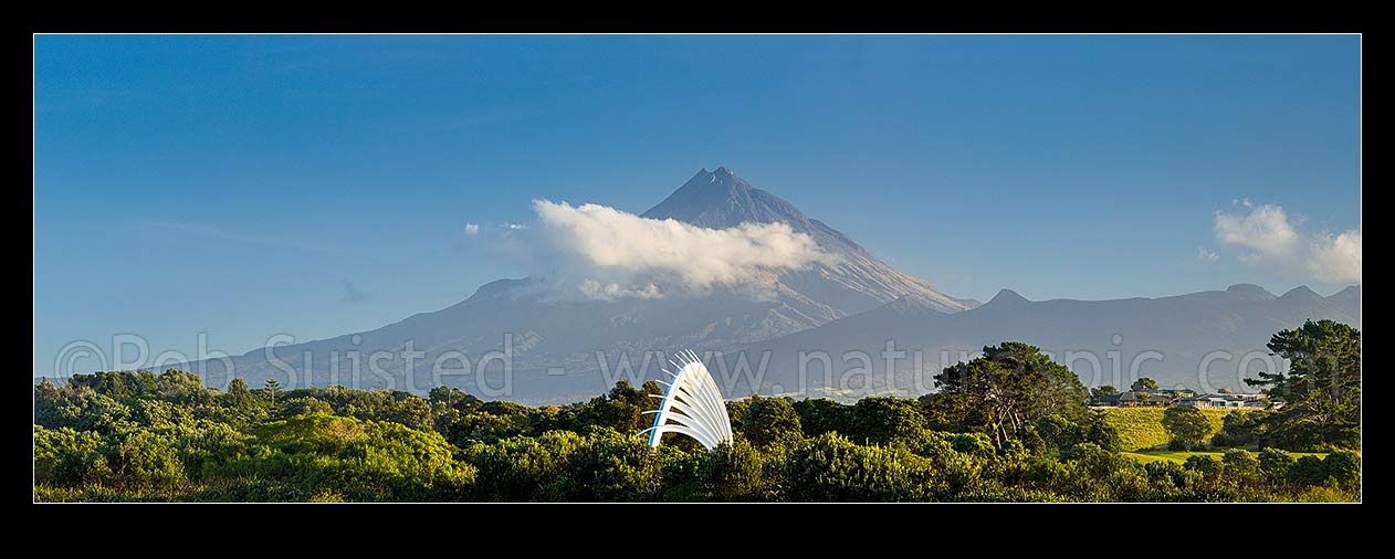 Image of Te Rewarewa Bridge over the Waiwhakaiho River on the New Plymouth Coastal walkway, with Mt Taranaki (2511m, centre and Pouakai Range left) behind. Panorama, New Plymouth, New Plymouth District, Taranaki Region, New Zealand (NZ) stock photo image