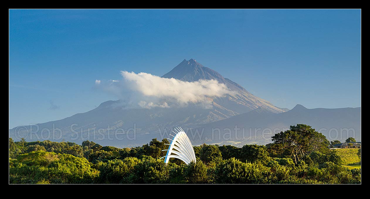 Image of Te Rewarewa Bridge over the Waiwhakaiho River on the New Plymouth Coastal walkway, with Mt Taranaki (2511m, centre and Pouakai Range left) behind. Panorama, New Plymouth, New Plymouth District, Taranaki Region, New Zealand (NZ) stock photo image