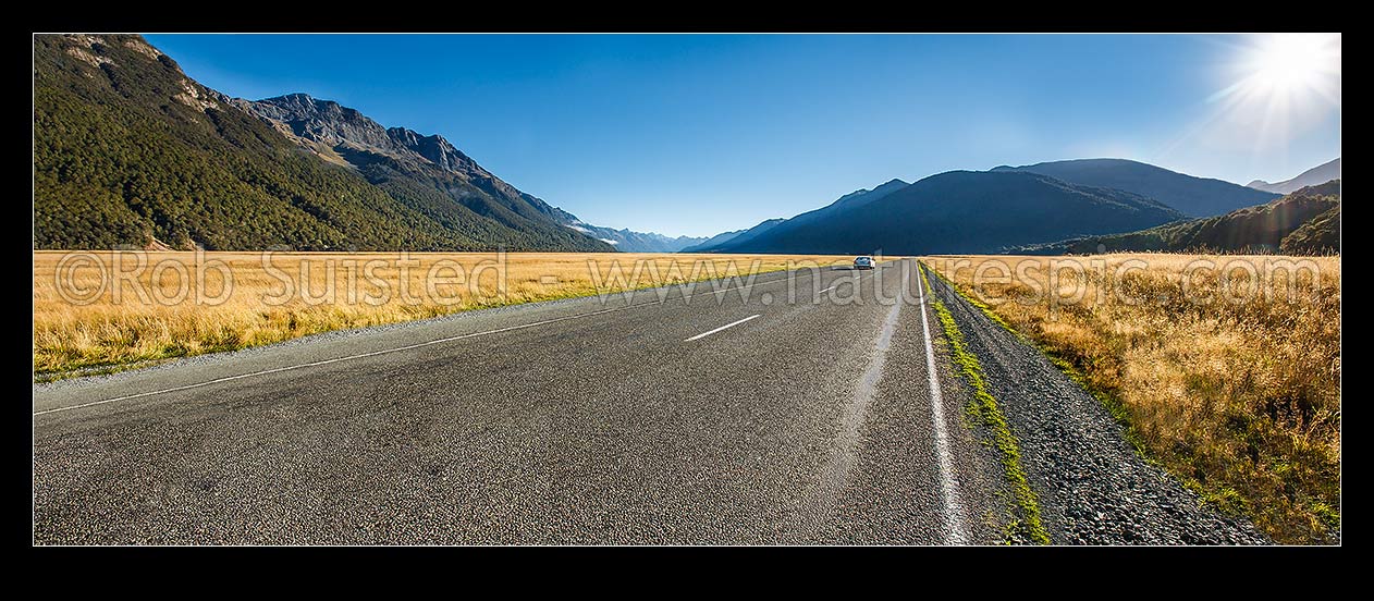 Image of Car on the Milford Te Anau Road running through the Eglinton Valley flats.  State Highway 94. Panorama from ID: 30434, Fiordland National Park, Southland District, Southland Region, New Zealand (NZ) stock photo image