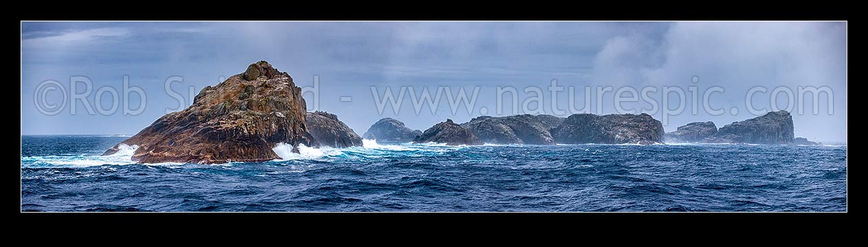 Image of Bounty Islands main group panorama from the east. Lion Island (left), Ruatara Is (behind), Ranfurly, Tunnel, Depot, Proclamation and Spider Island (right). Moutere Hauriri, Bounty Islands, NZ Sub Antarctic District, NZ Sub Antarctic Region, New Zealand (NZ) stock photo image