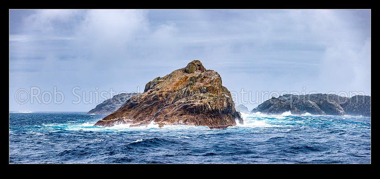 Image of Bounty Islands main group. Lion Island (left), Ruatara Is (behind left), Ranfurly, Tunnel, Depot and Proclamation Islands far right. Moutere Hauriri panorama, Bounty Islands, NZ Sub Antarctic District, NZ Sub Antarctic Region, New Zealand (NZ) stock photo image