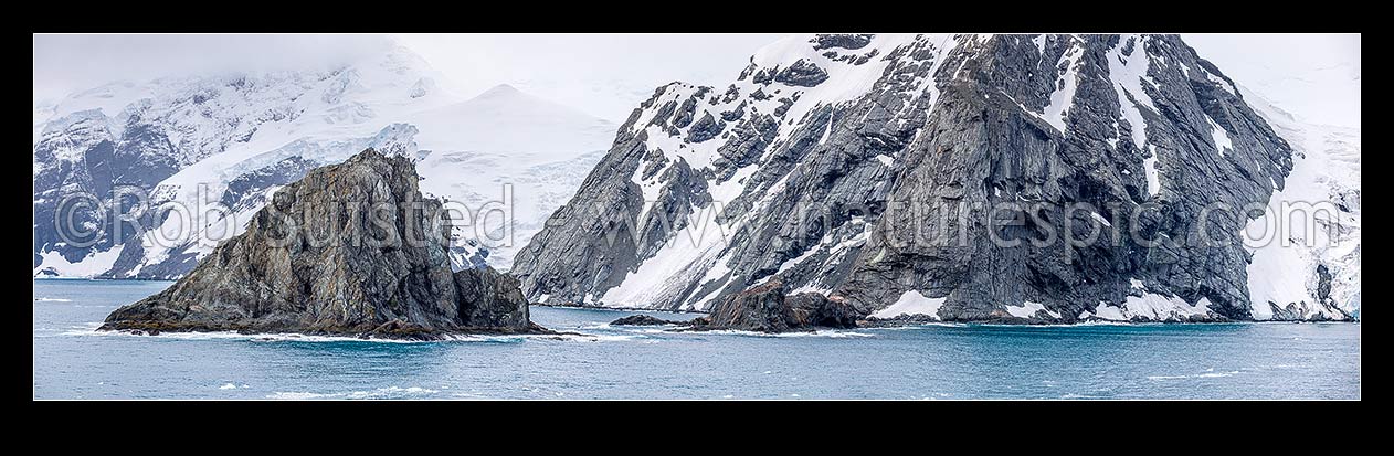 Image of Point Wild on Elephant Island, where Shackleton's men stayed for 128 days (centre). Ice-covered mountainous island in outer reaches of South Shetland Islands. Panorama, Elephant Island, Antarctica Region, Antarctica stock photo image