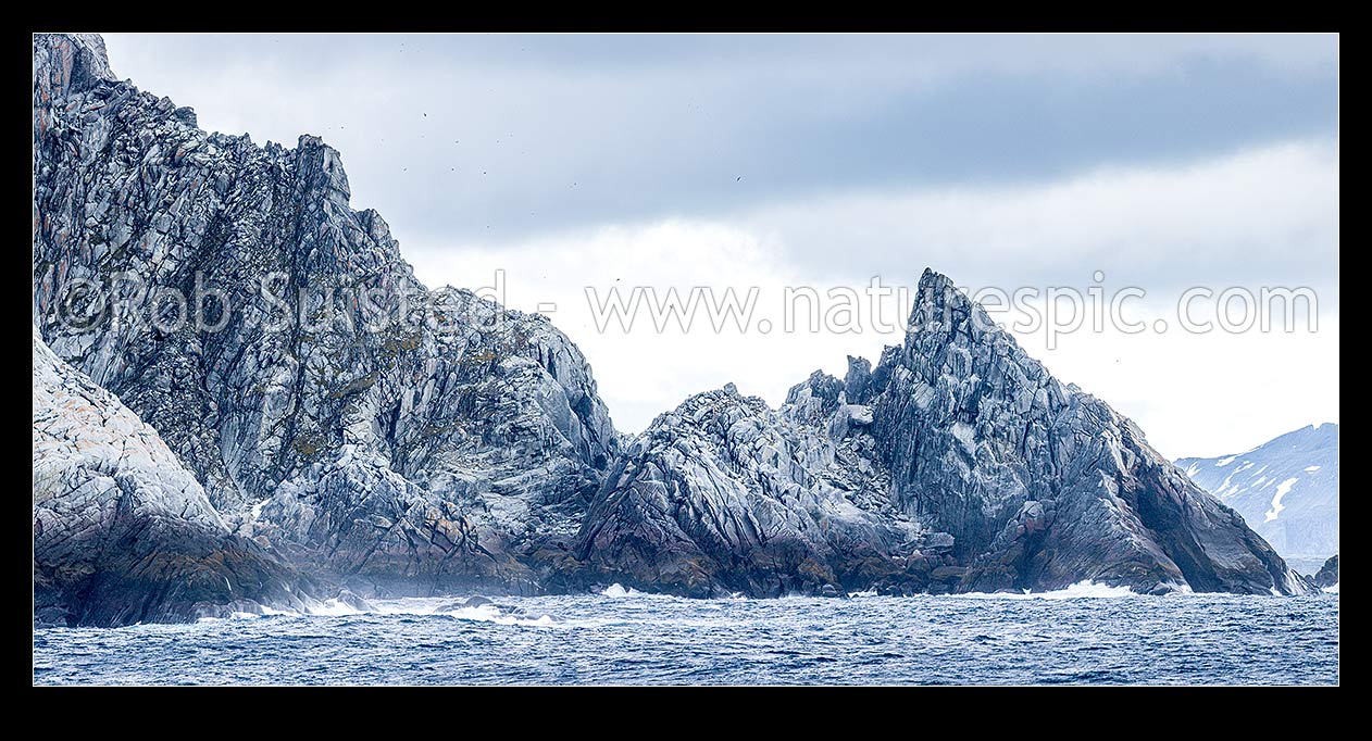 Image of Rugged rocky shore of Cornwallis Island in the South Shetland Islands. Panorama. Granodiorite rock, Elephant Island, Antarctica Region, Antarctica stock photo image