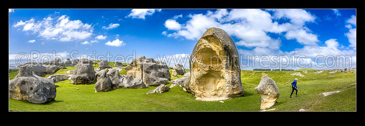 Image of Elephant Rocks limestone site in the Waitaki Whitestone Geopark, Maerewhenua. Panorama of the uplifted weathered marine limestone, Duntroon, Waitaki District, Canterbury Region, New Zealand (NZ) stock photo image